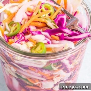 Easy Curtido Recipe, a vibrant Salvadoran cabbage slaw, served in a clean container.