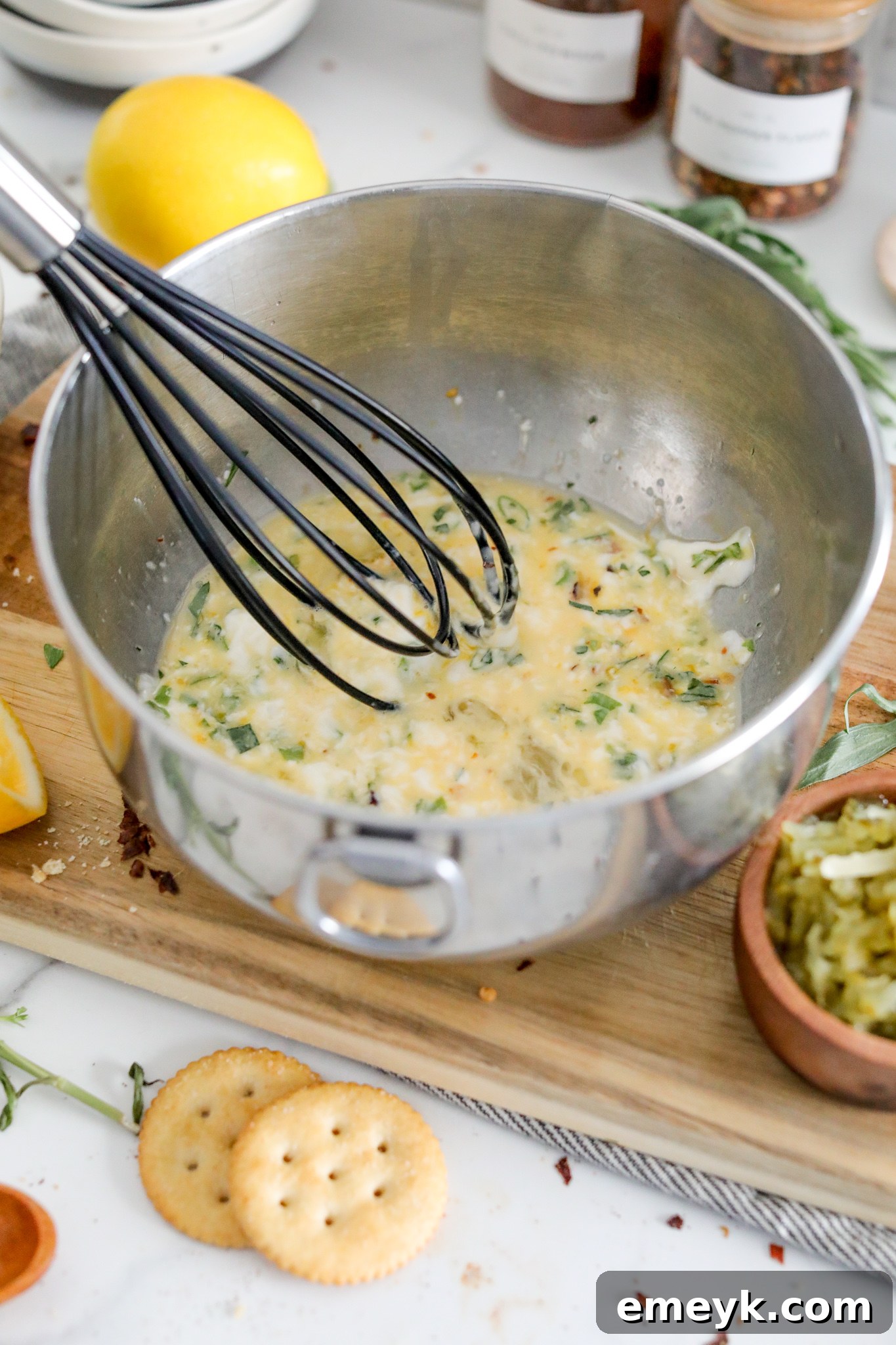 All the ingredients for the easy crab cake recipe mixed in a bowl, ready for forming into patties.