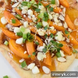 Goat Cheese Apricot Pizza, a close-up showing the melted cheese and fresh fruit.