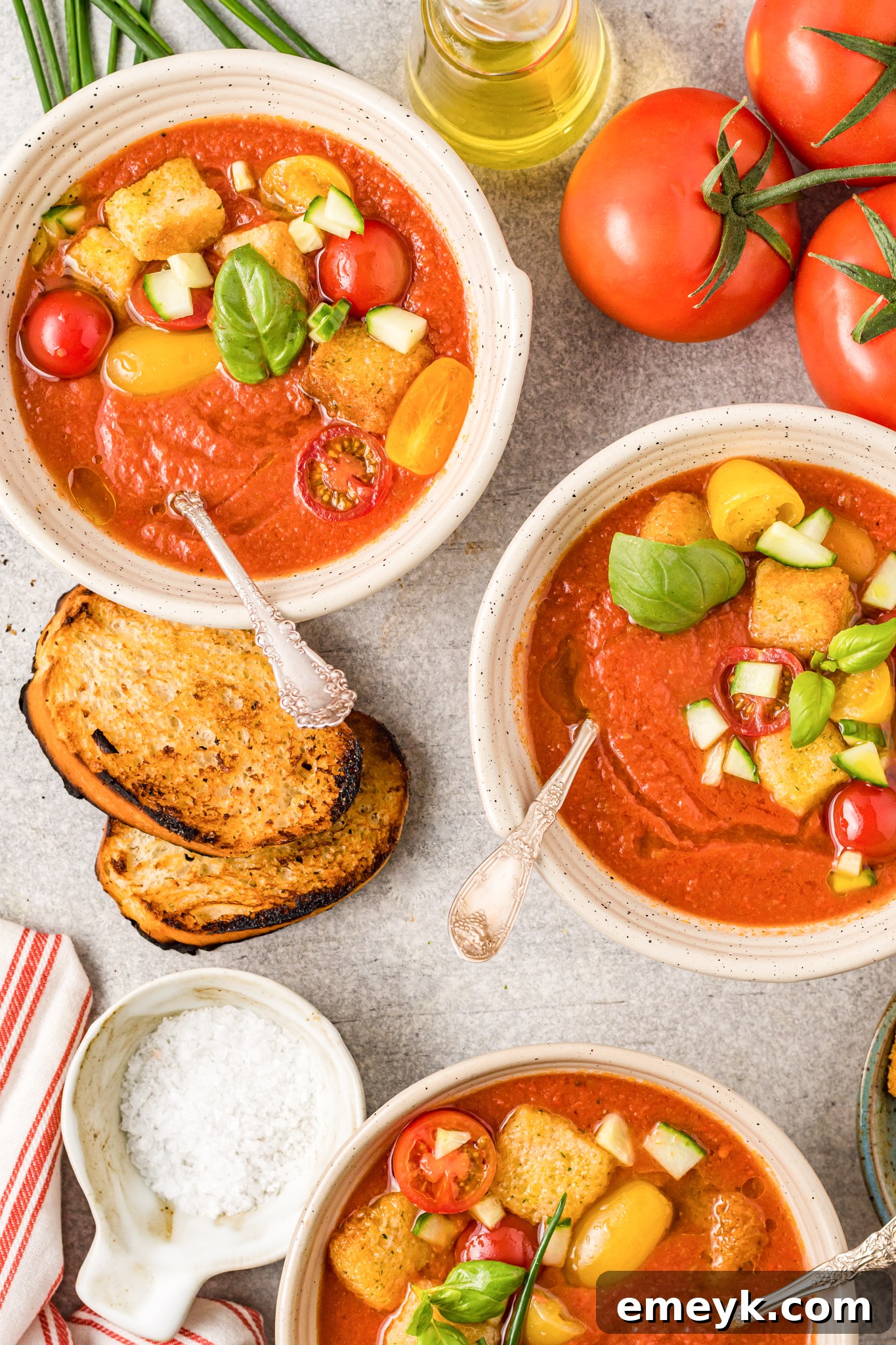 Easy Gazpacho Recipe served in elegant bowls, ready to be garnished.