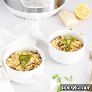 Instant Pot Mushroom Risotto in white bowls, ready to serve.