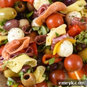Antipasto Skewers on a white platter.