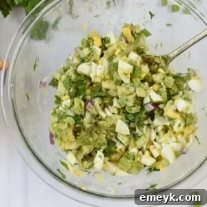A delectable serving of Avocado Egg Salad on perfectly toasted brioche bread.