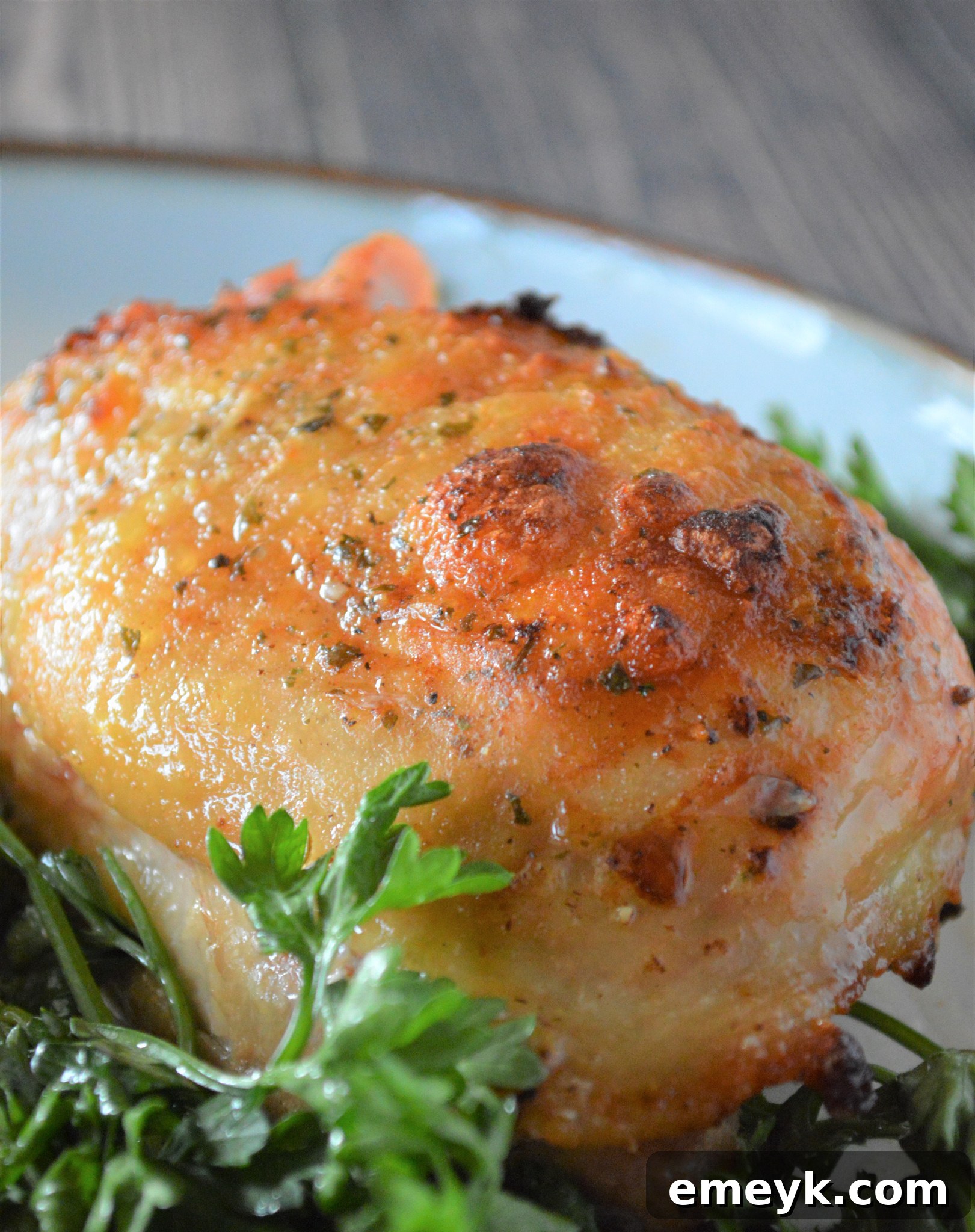 Creamy Ranch Chicken Thighs 7 Oven Baked Ranch Chicken Thighs presented beautifully in a white dish, garnished and ready.