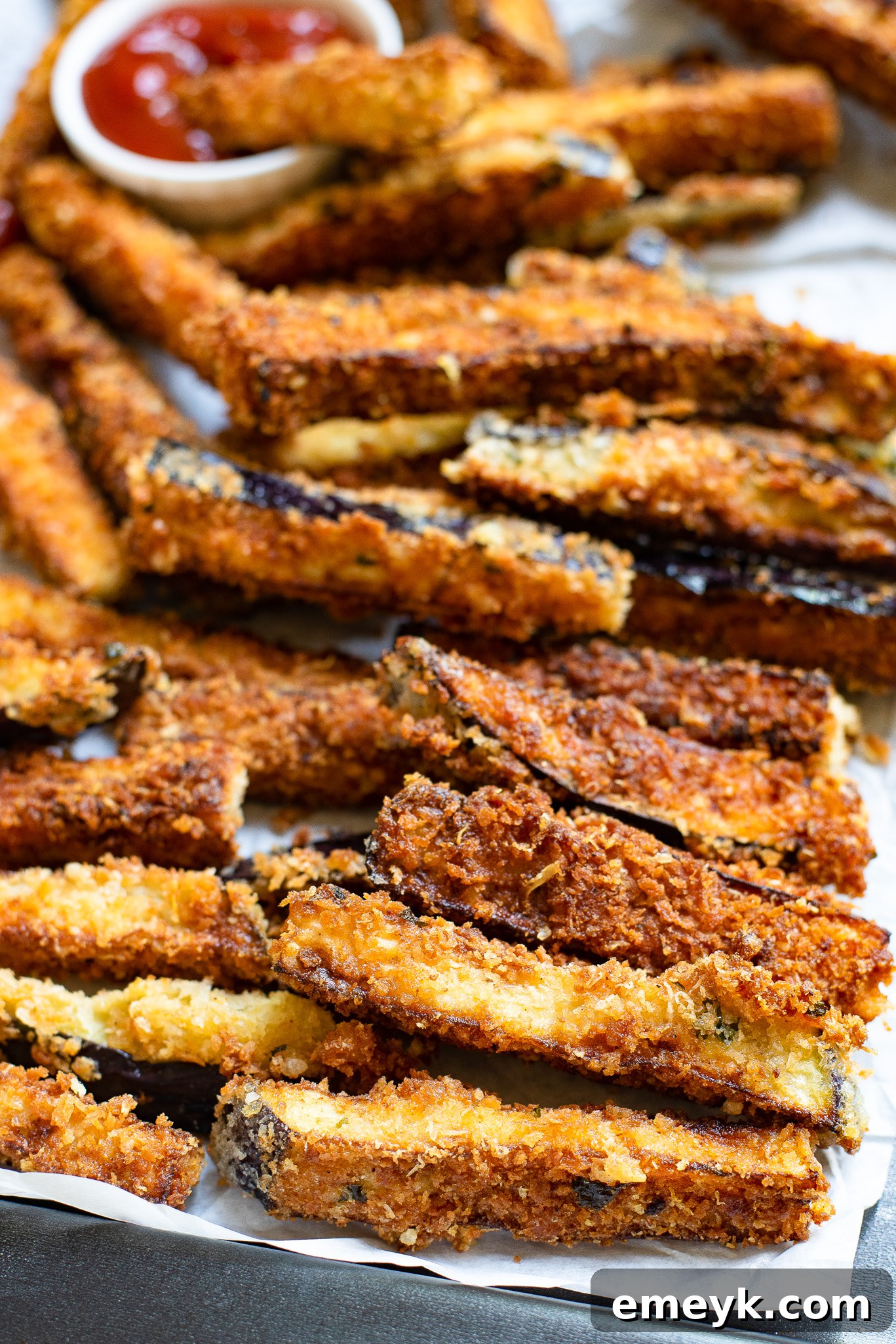 Air Fryer Eggplant Fries Recipe on parchment paper.
