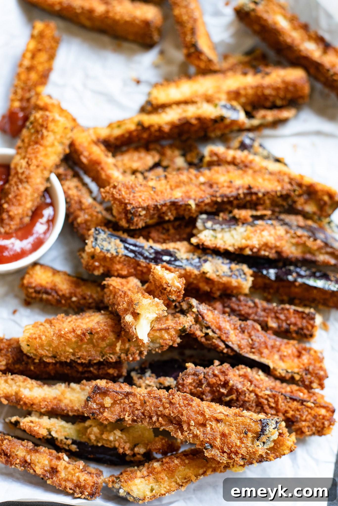 Air Fryer Eggplant Fries Recipe in dipping sauce.