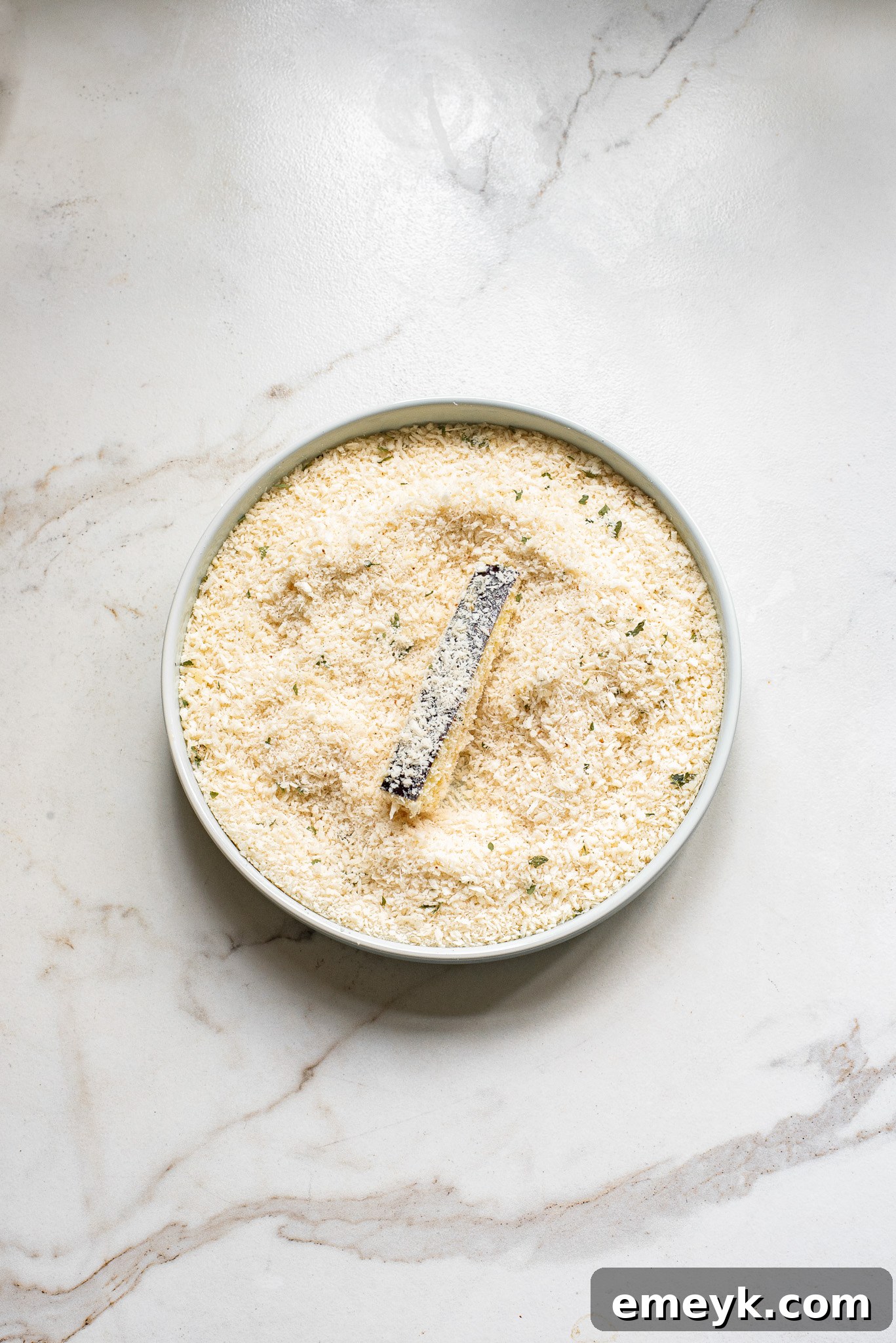 Air Fryer Eggplant Fries Recipe eggplant in the breadcrumb mixture. 