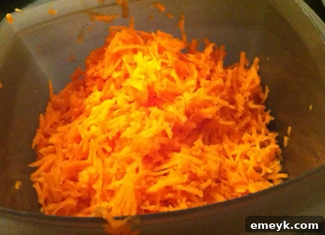 Freshly shredded carrots, ready for baking delicious carrot cupcakes