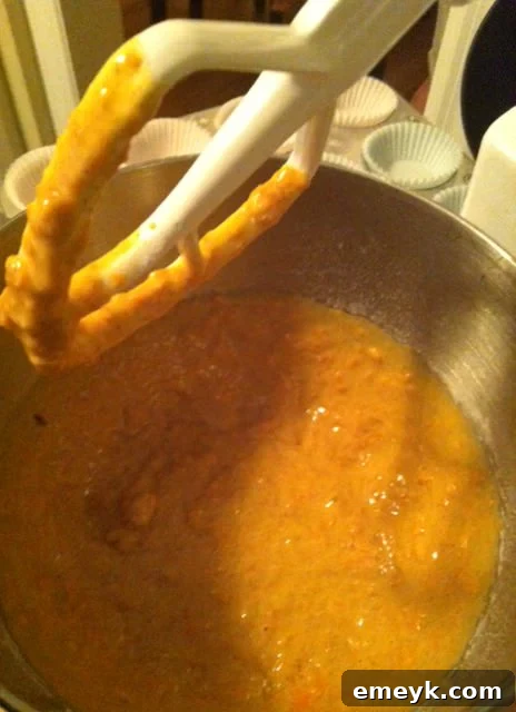 Close-up of the delicious carrot cupcake batter in a mixing bowl