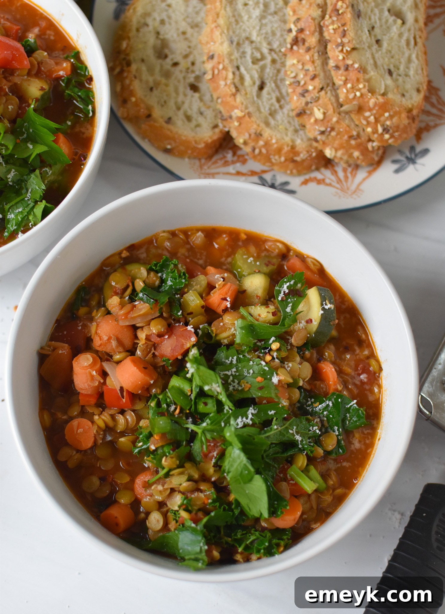 Italian Style Lentil Soup served with a side of crusty bread, perfect for dipping.