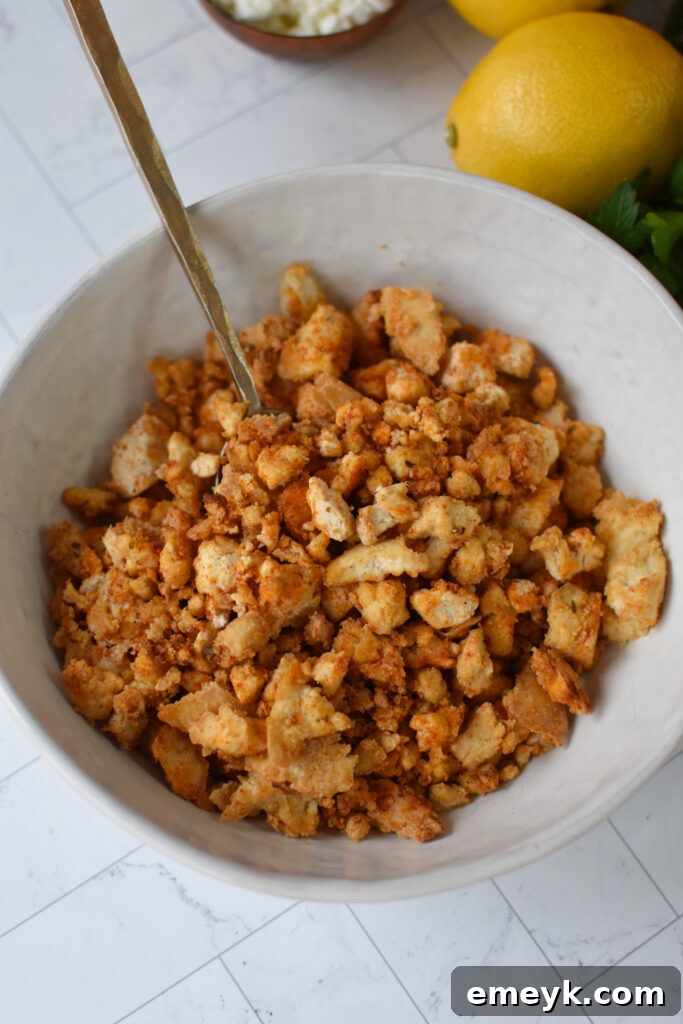 Crumbled and seasoned Mediterranean Style Tofu Tacos filling in a bowl.
