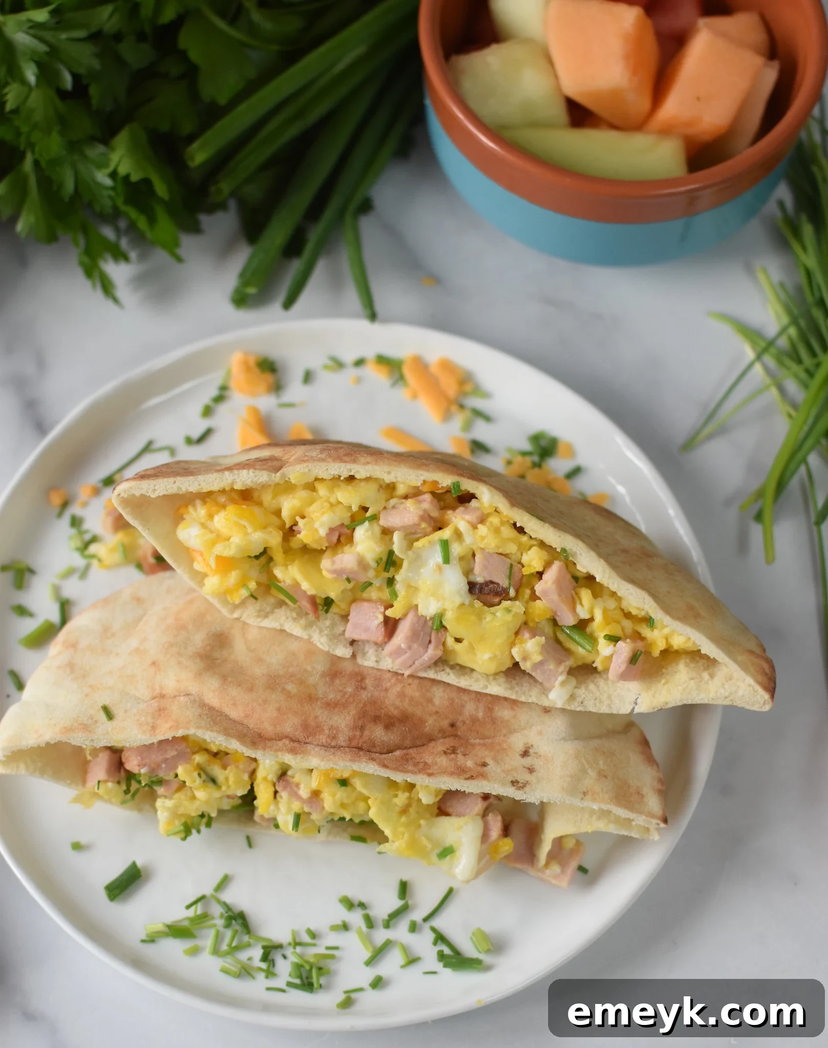 Sunrise Pita Pockets 5 A freshly prepared Breakfast Pita Recipe displayed on a clean white plate, ready to be enjoyed.