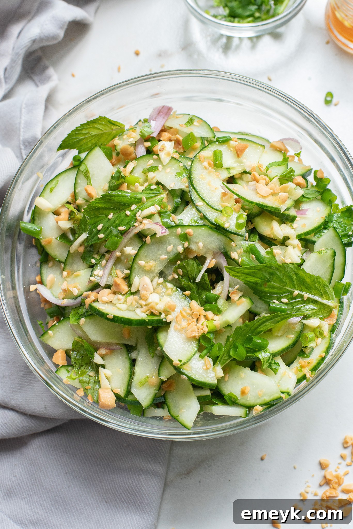 Thai Cucumber Salad in glass bowl.