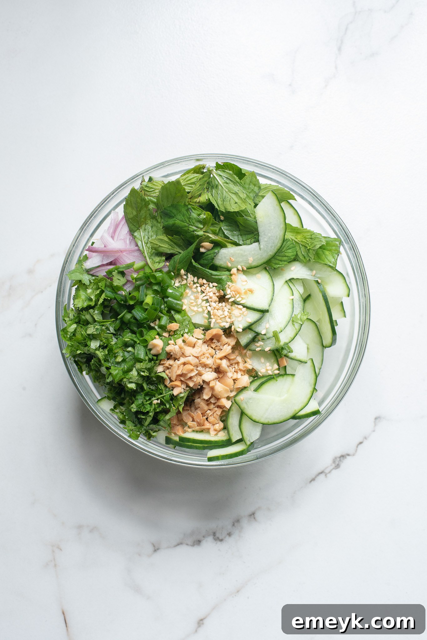 Thai Cucumber Salad ingredients in a bowl. 