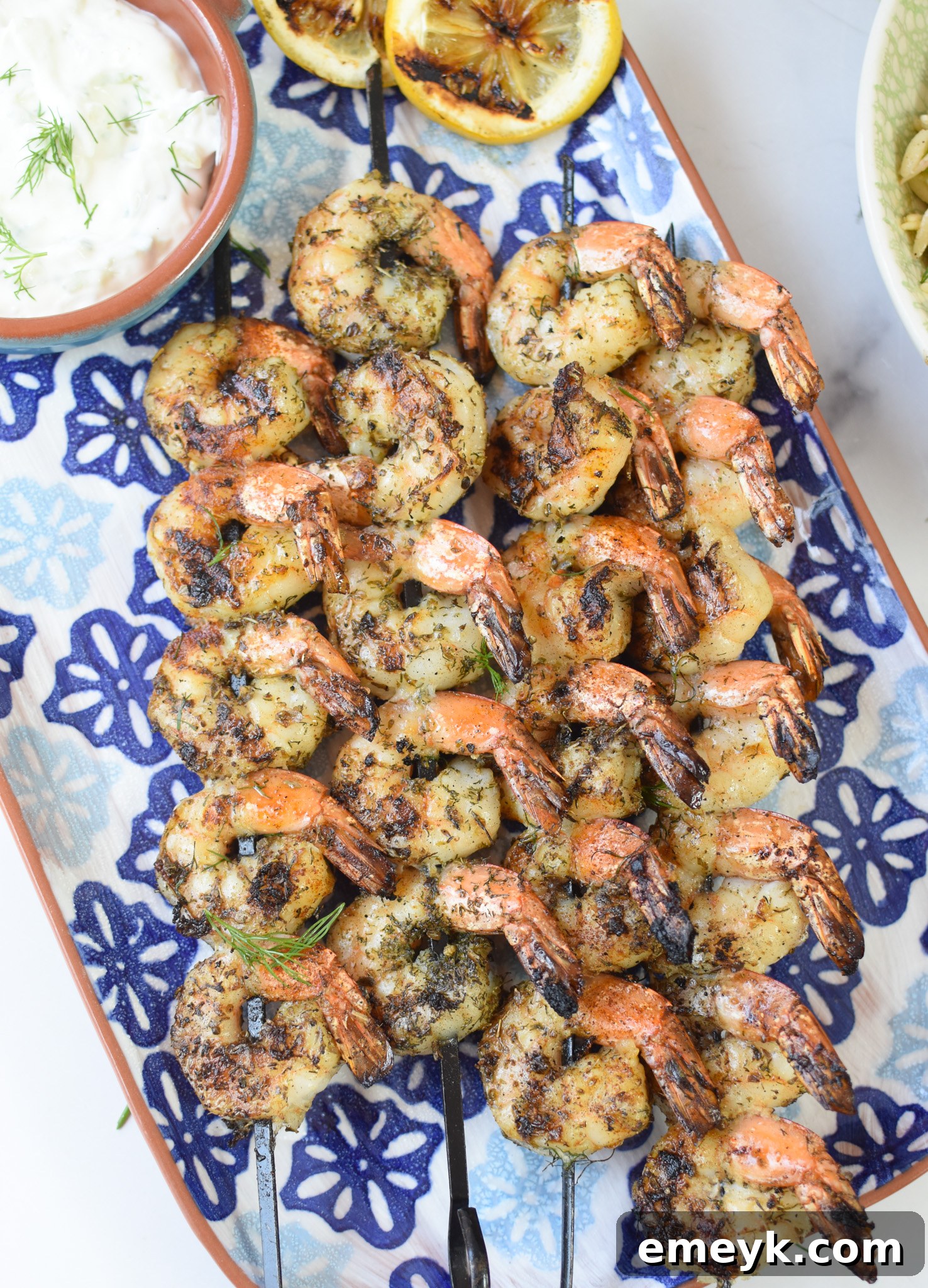 Greek Shrimp Marinade on a blue plate.