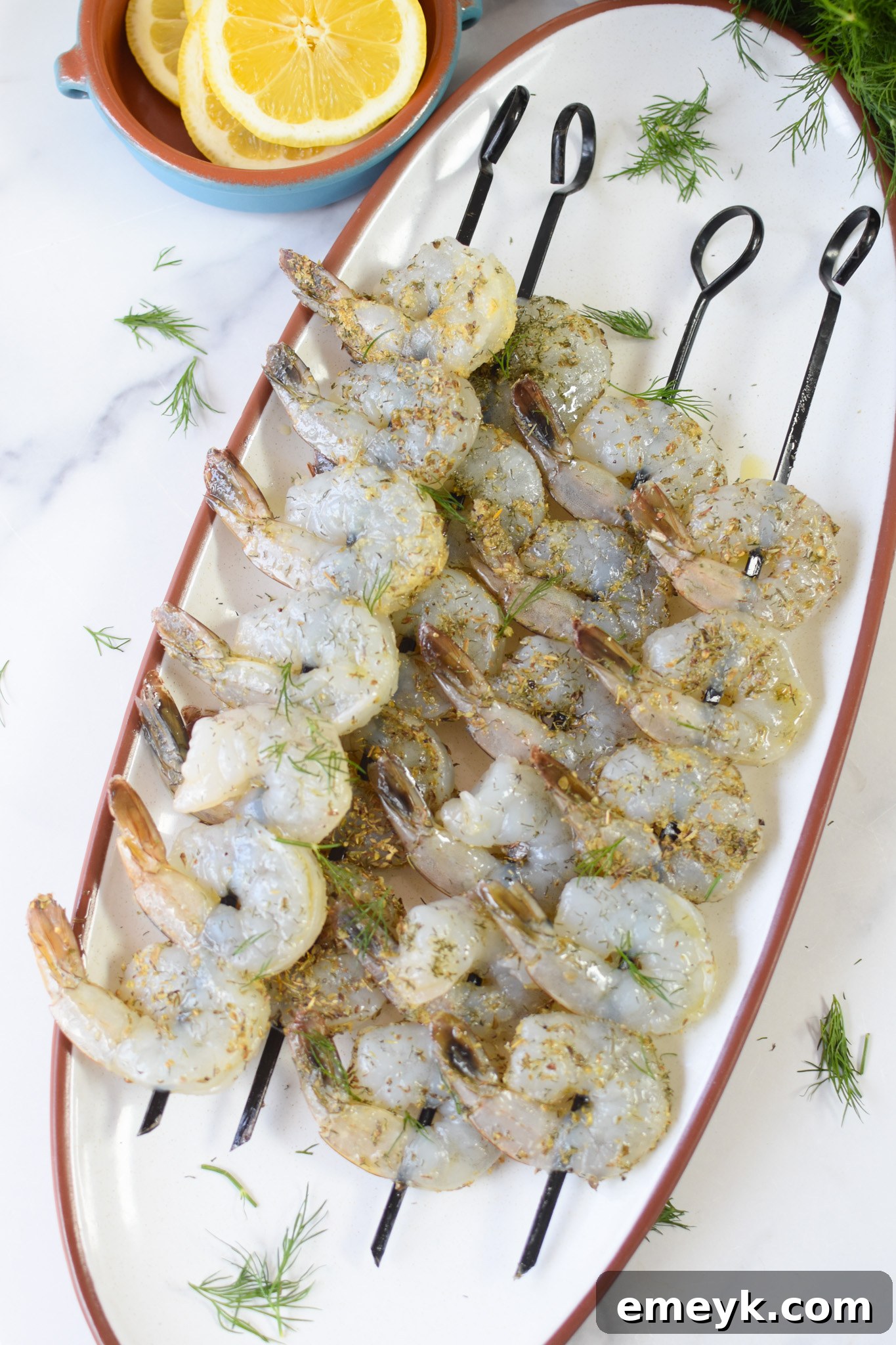 Greek Shrimp Marinade shrimp on skewers.
