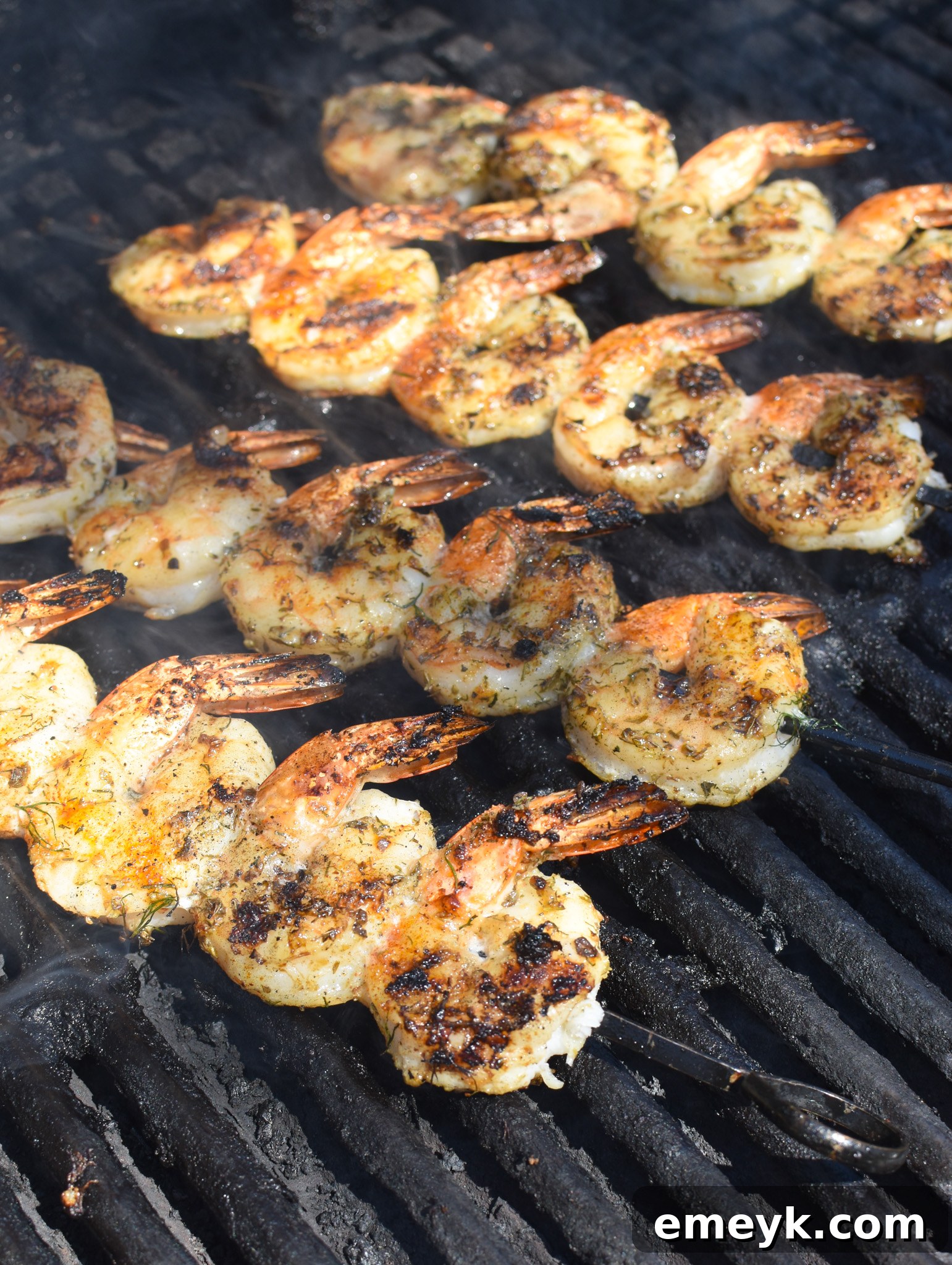 Greek Shrimp Marinade shrimp on a grill.