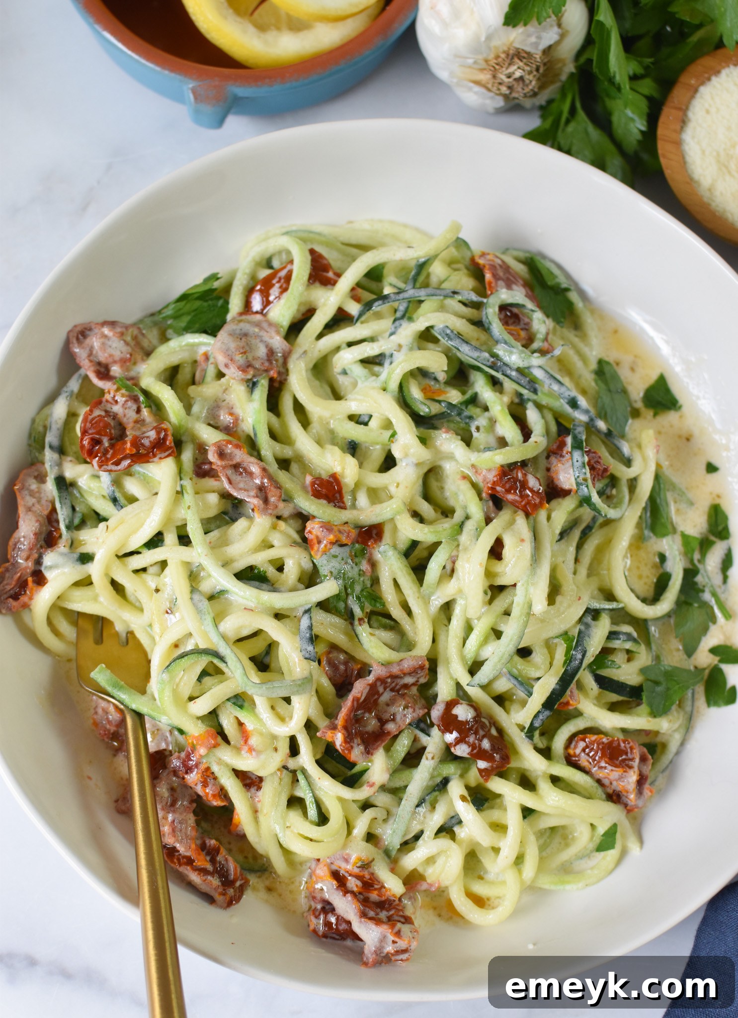 Creamy Zucchini Noodle Alfredo 2 Creamy Alfredo Zoodles Recipe with vibrant sun-dried tomatoes, a perfect low-carb dinner idea.