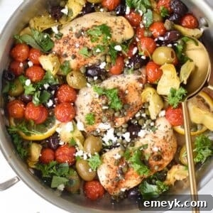 Mediterranean Skillet Chicken prepared in a pan.