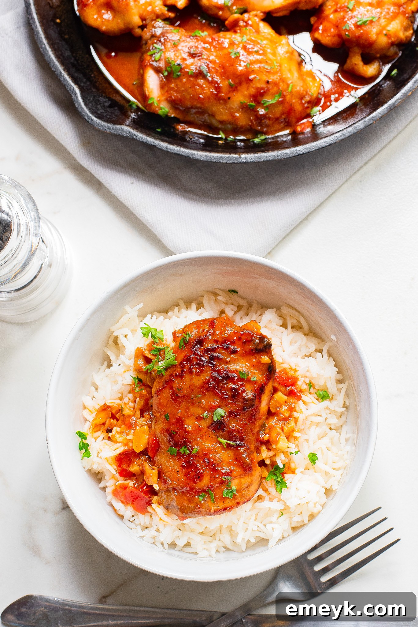 Harissa Chicken Recipe garnished with fresh cilantro.
