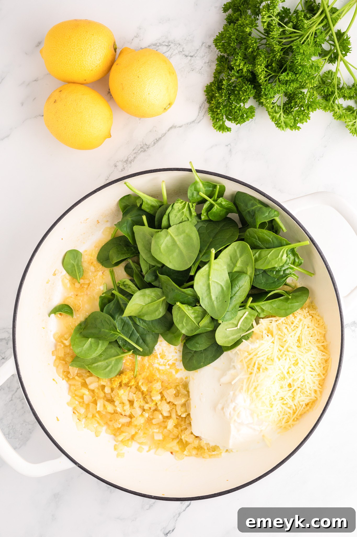 Lemon Ricotta Pasta ingredients mixed in a pot, creating the sauce.