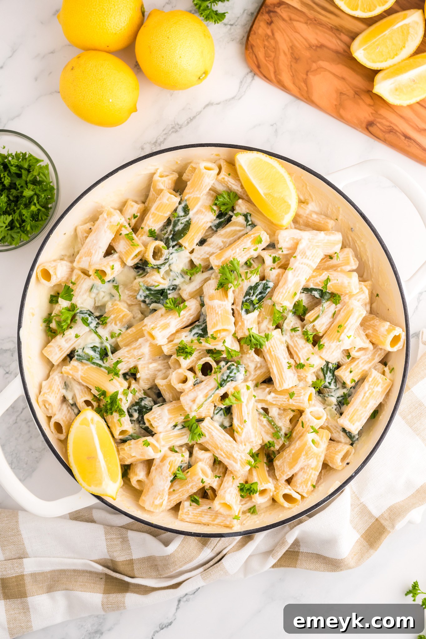 Lemon Ricotta Pasta ingredients expertly mixed in a pot.