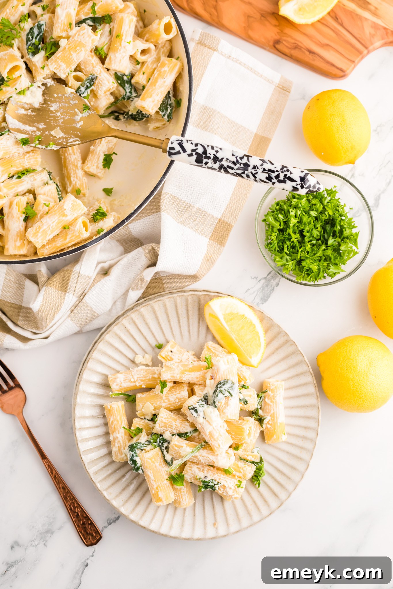 Lemon Ricotta Pasta served on a plate, garnished with parsley.