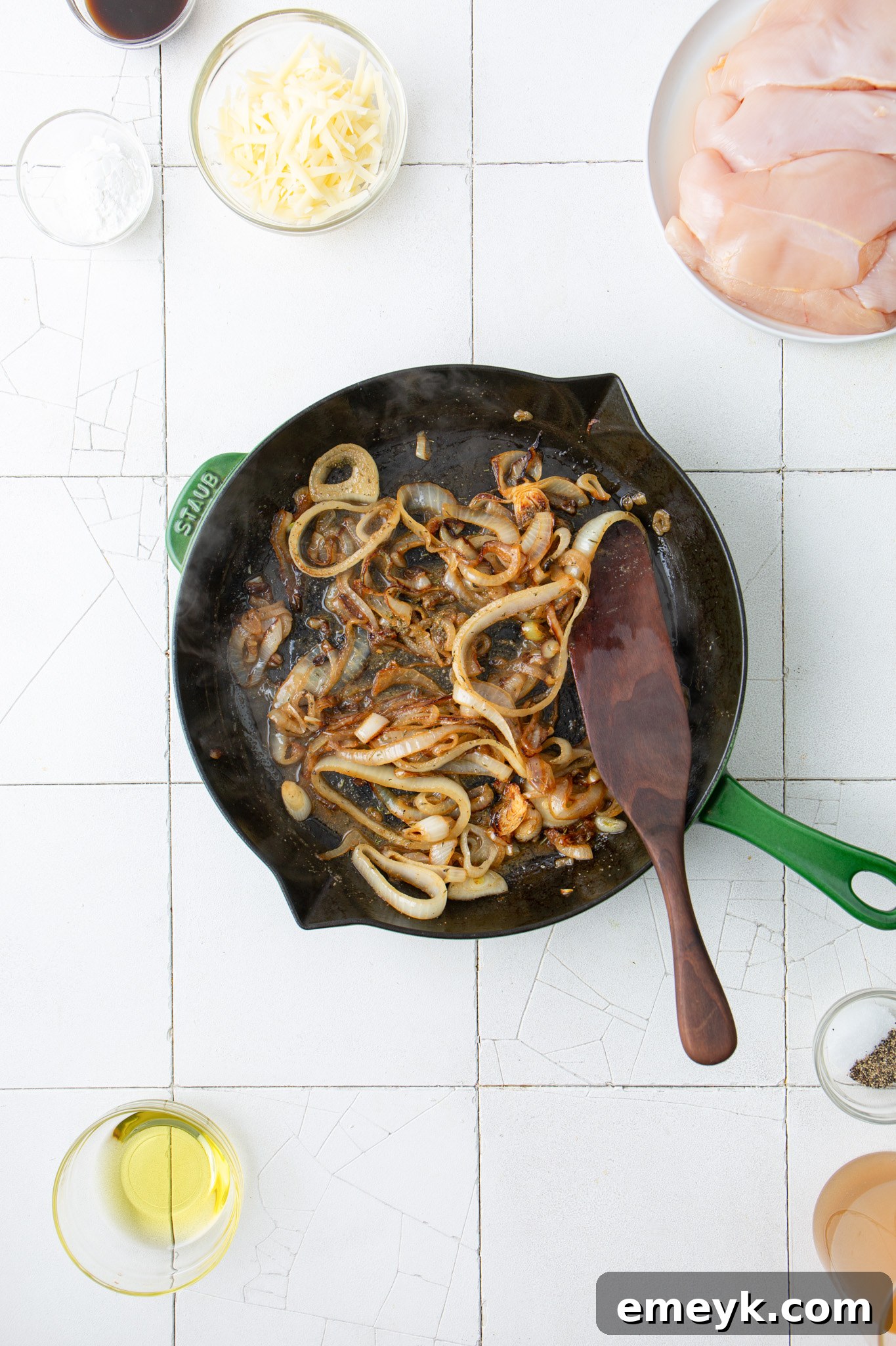 Caramelizing onions in a skillet for French Onion Chicken.