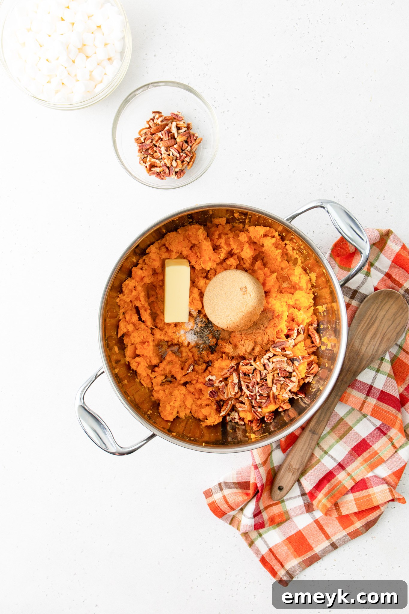 Sweet Potato Casserole with Marshmallows butter melting in a pot