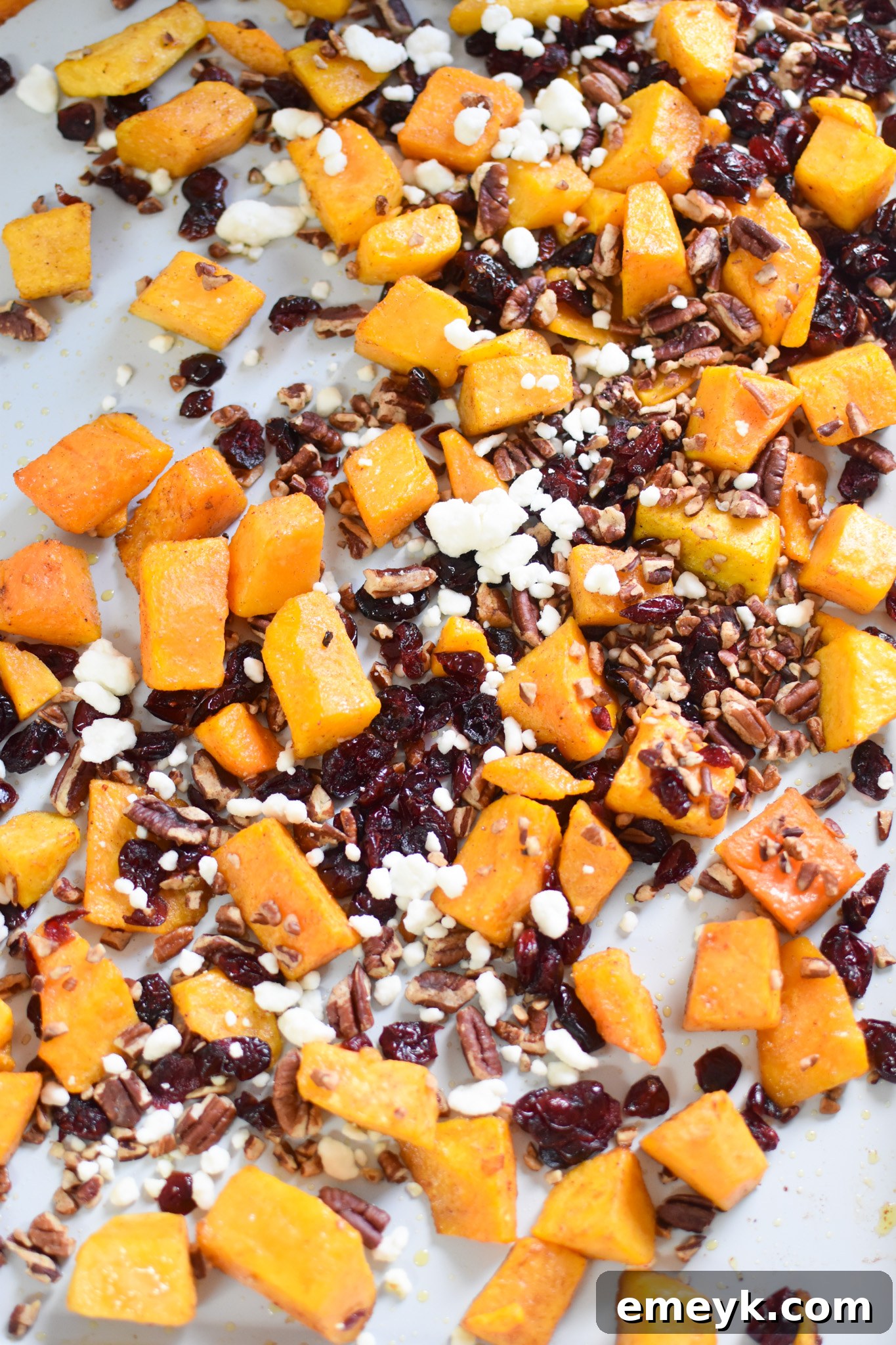 Roasted Butternut Squash with Cranberries on baking tray