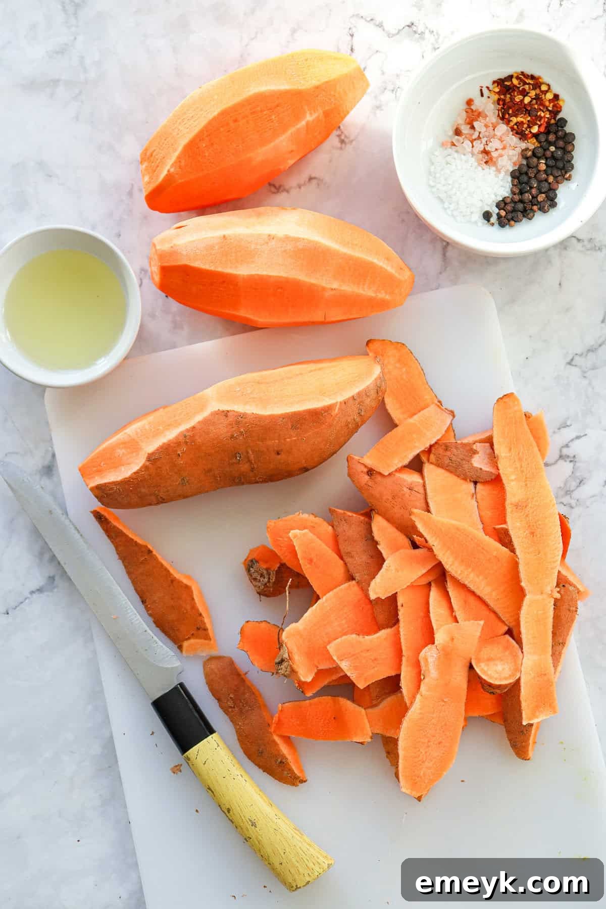 Sweet potato fries uniformly cut and ready for seasoning
