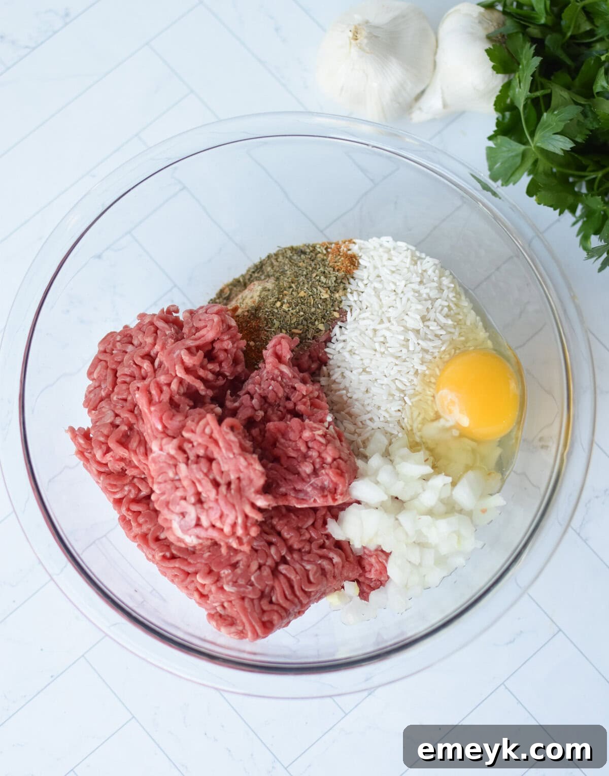 Rice Spiked Meatballs 6 Ground beef mixture for Porcupine Meatballs in a bowl, ready to be shaped.