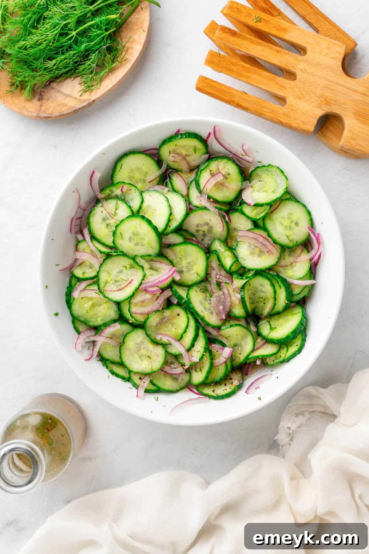 Cucumber Onion Salad in a white bowl