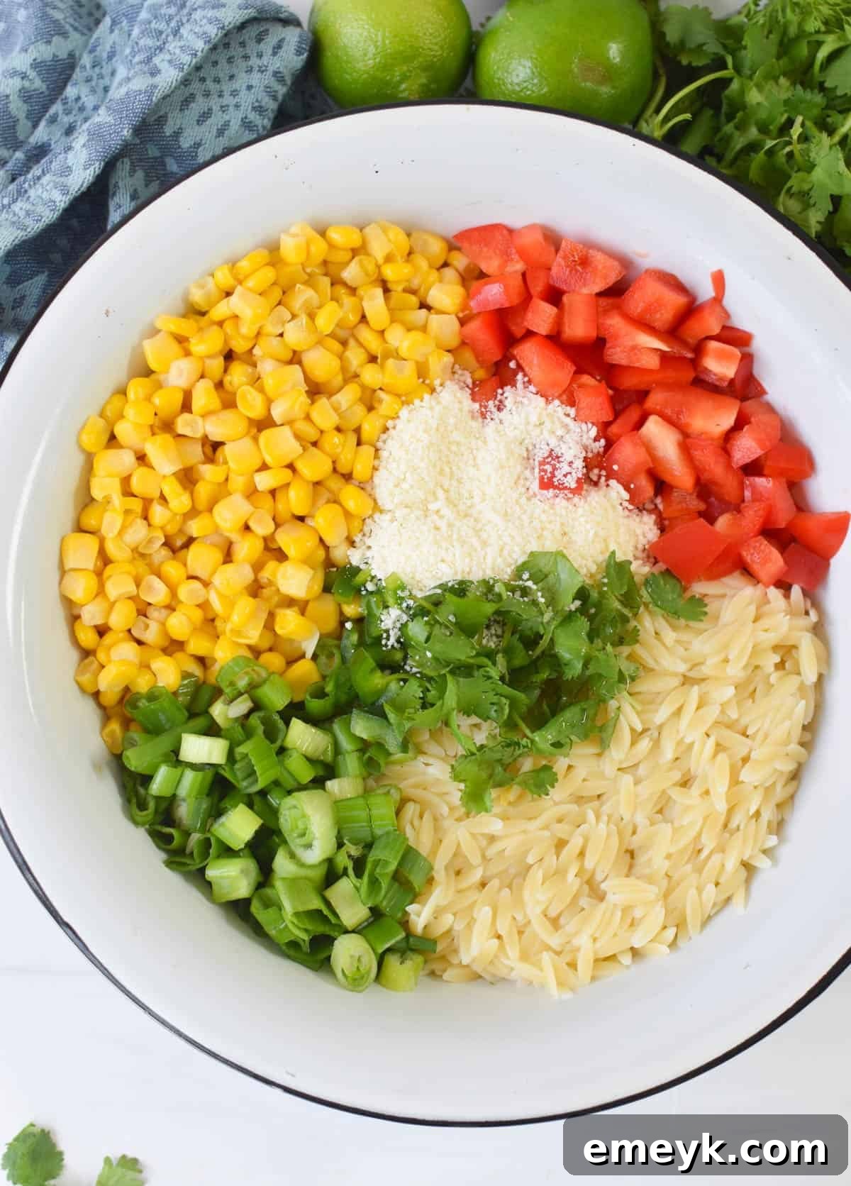 Mexican Street Corn Orzo Pasta Salad ingredients in a bowl