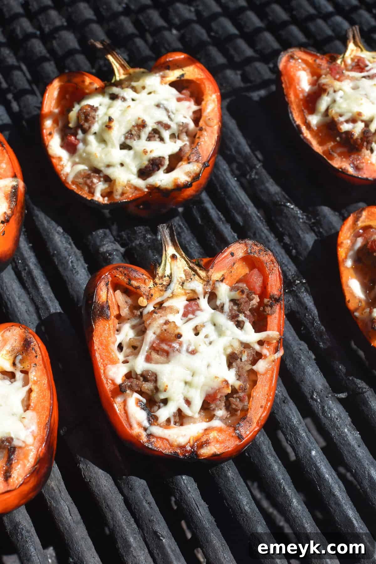 Grilled Stuffed Peppers on the grill with perfectly melted cheese.