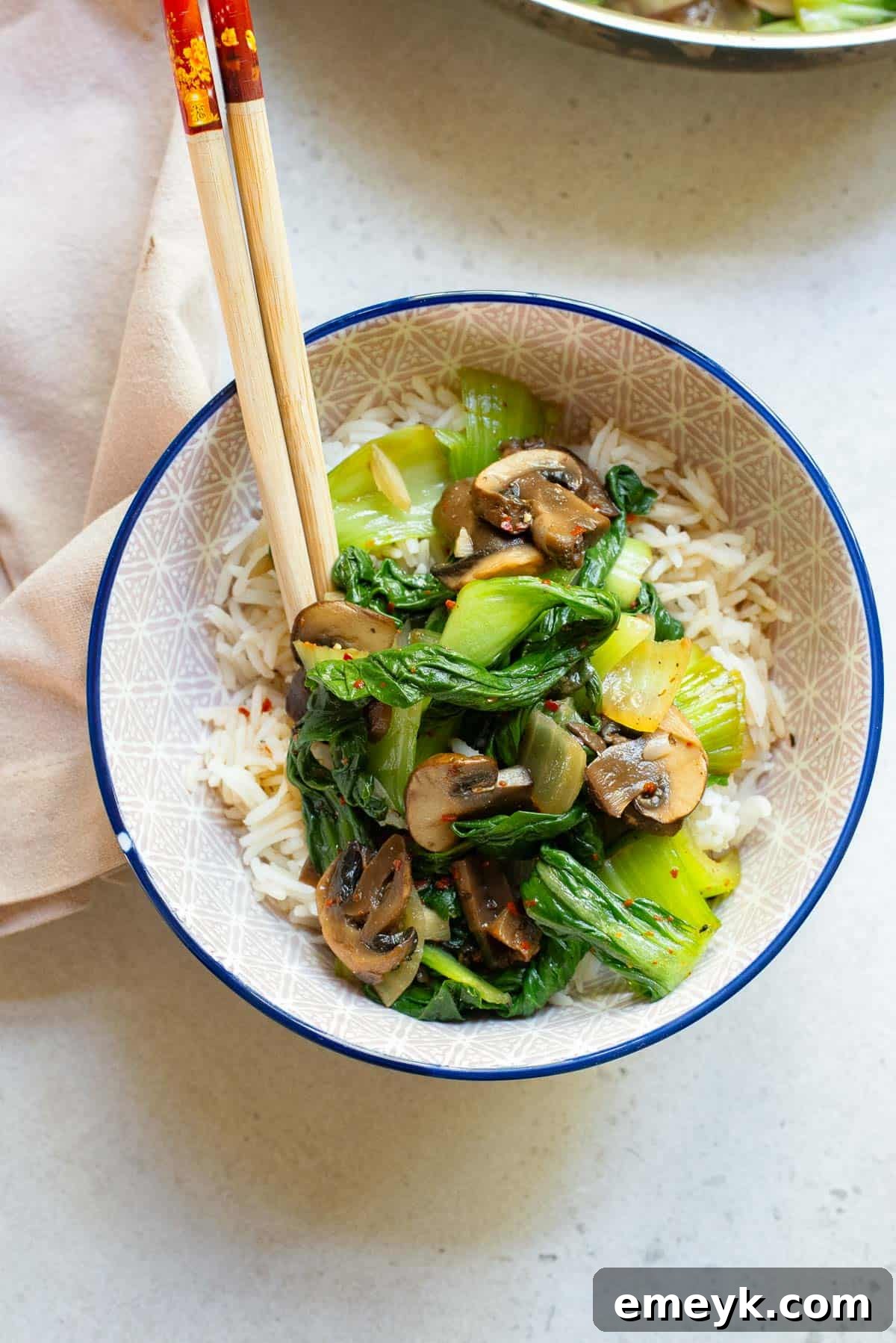Crisp Bok Choy Stir-Fry 3 Bok Choy Stir Fry in a bowl with chopsticks.