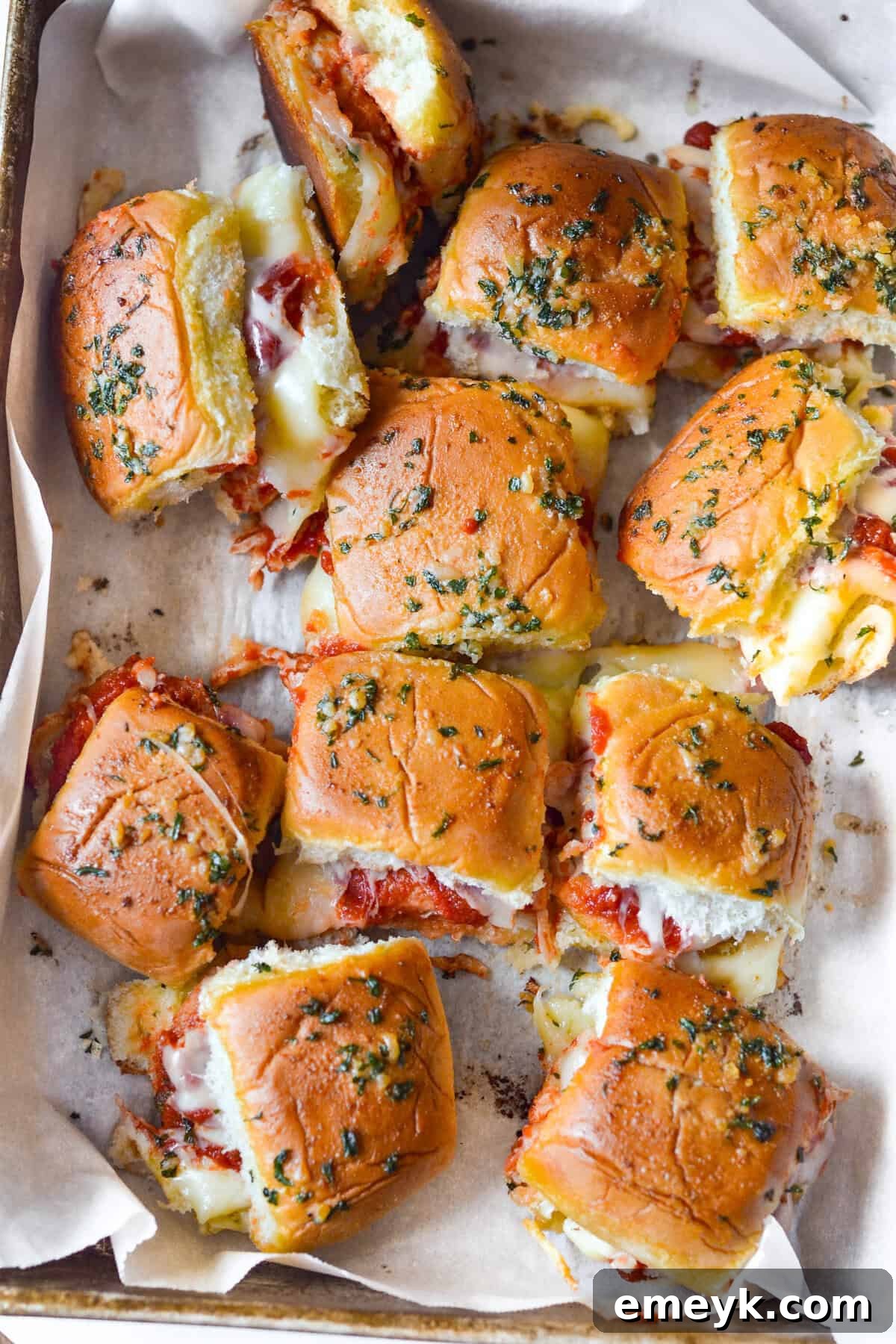 Easy Chicken Parmesan Sliders on a baking sheet before baking