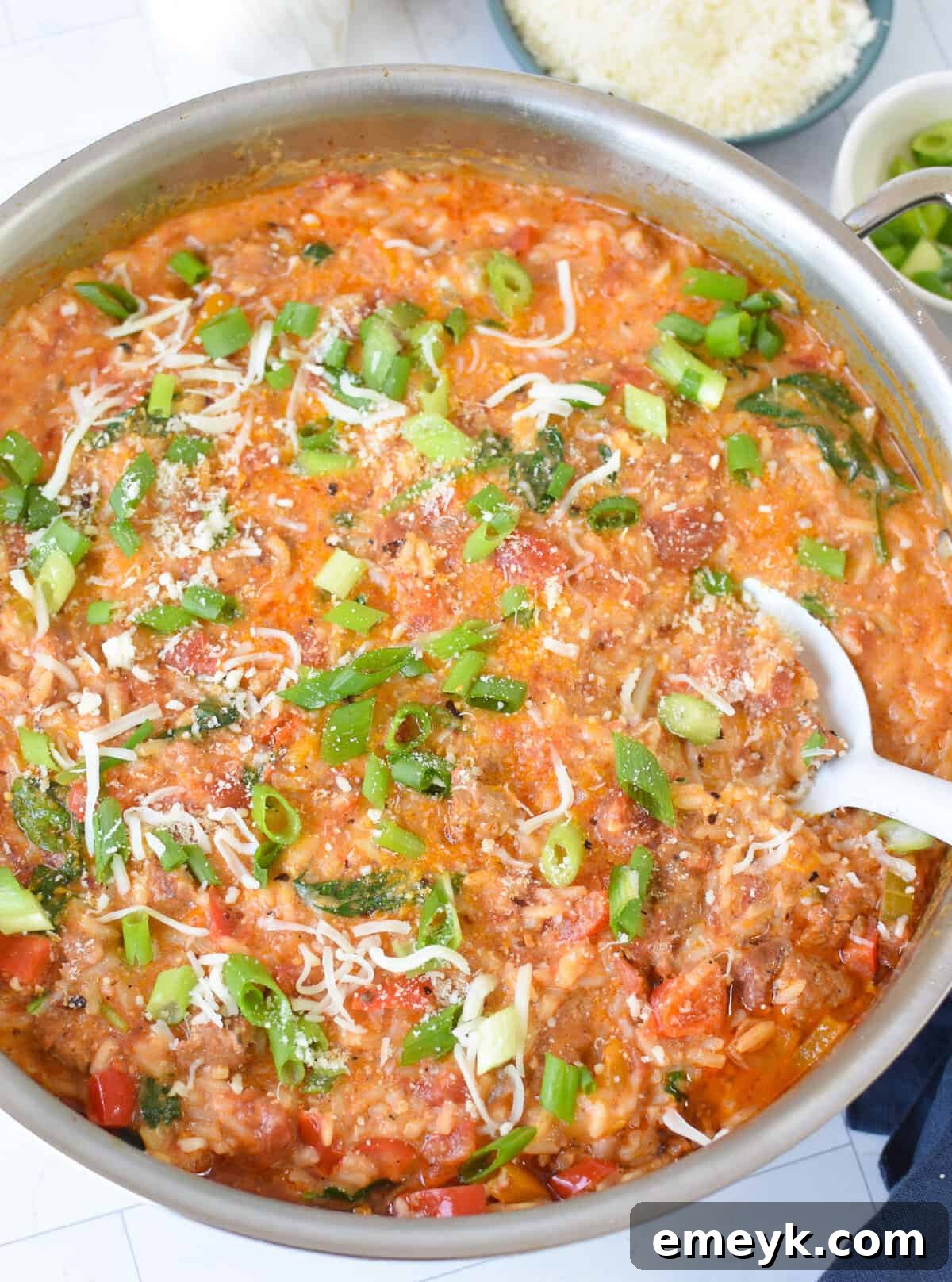 Creamy Cajun Sausage Rice Skillet in a skillet, ready to serve