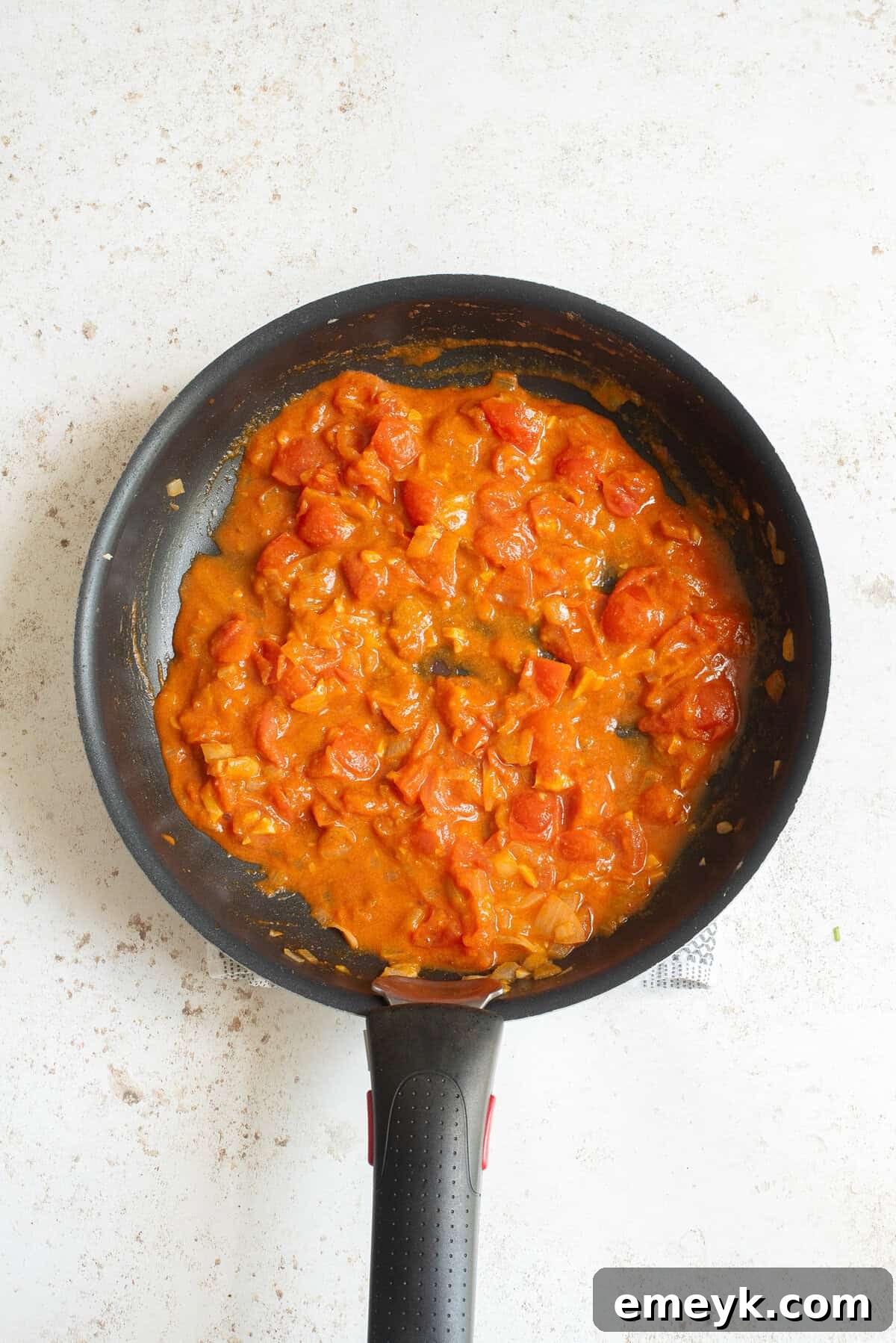 Sweet Potato Lentil Curry in a skillet, early stage