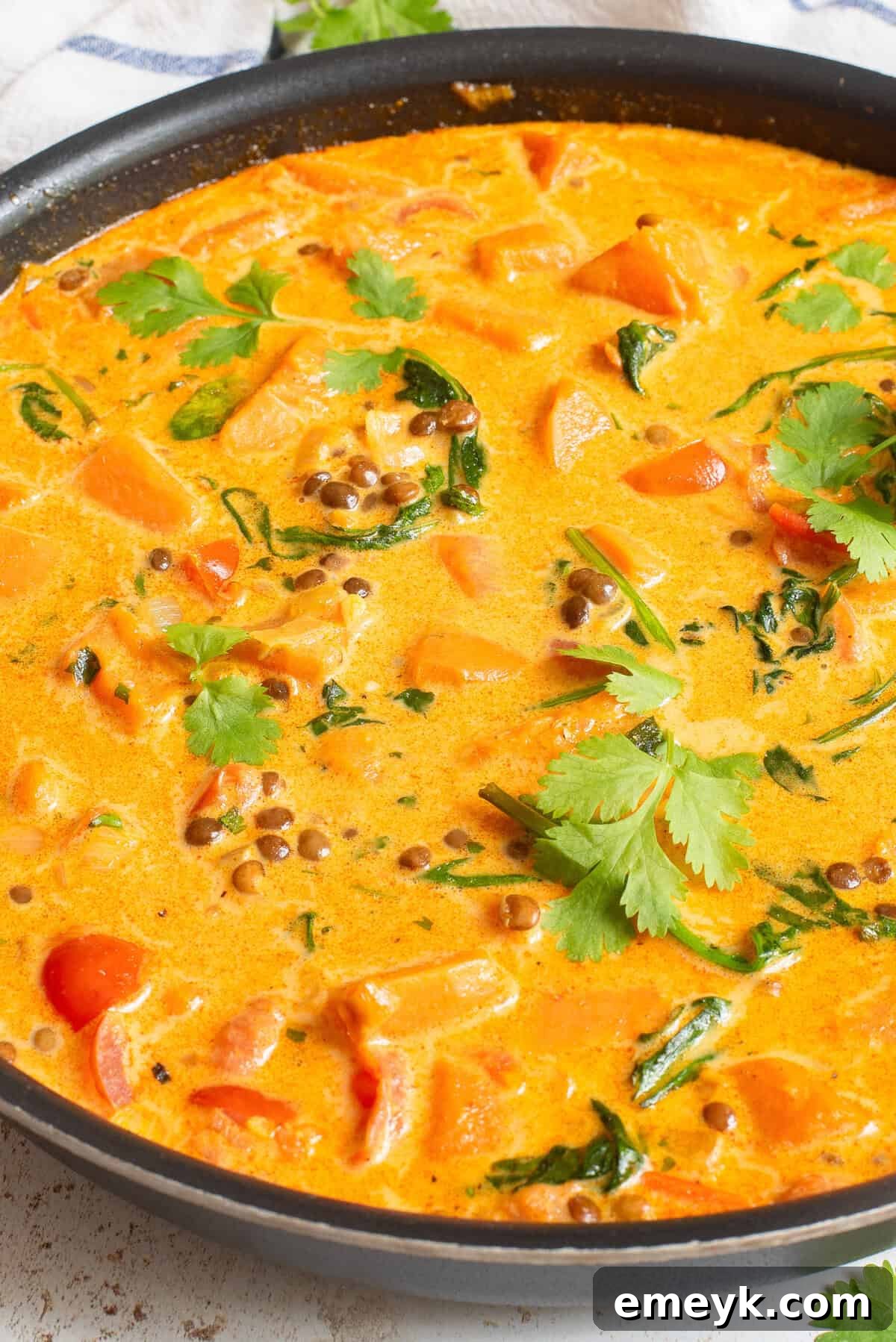 Sweet Potato Lentil Curry simmering in a pot