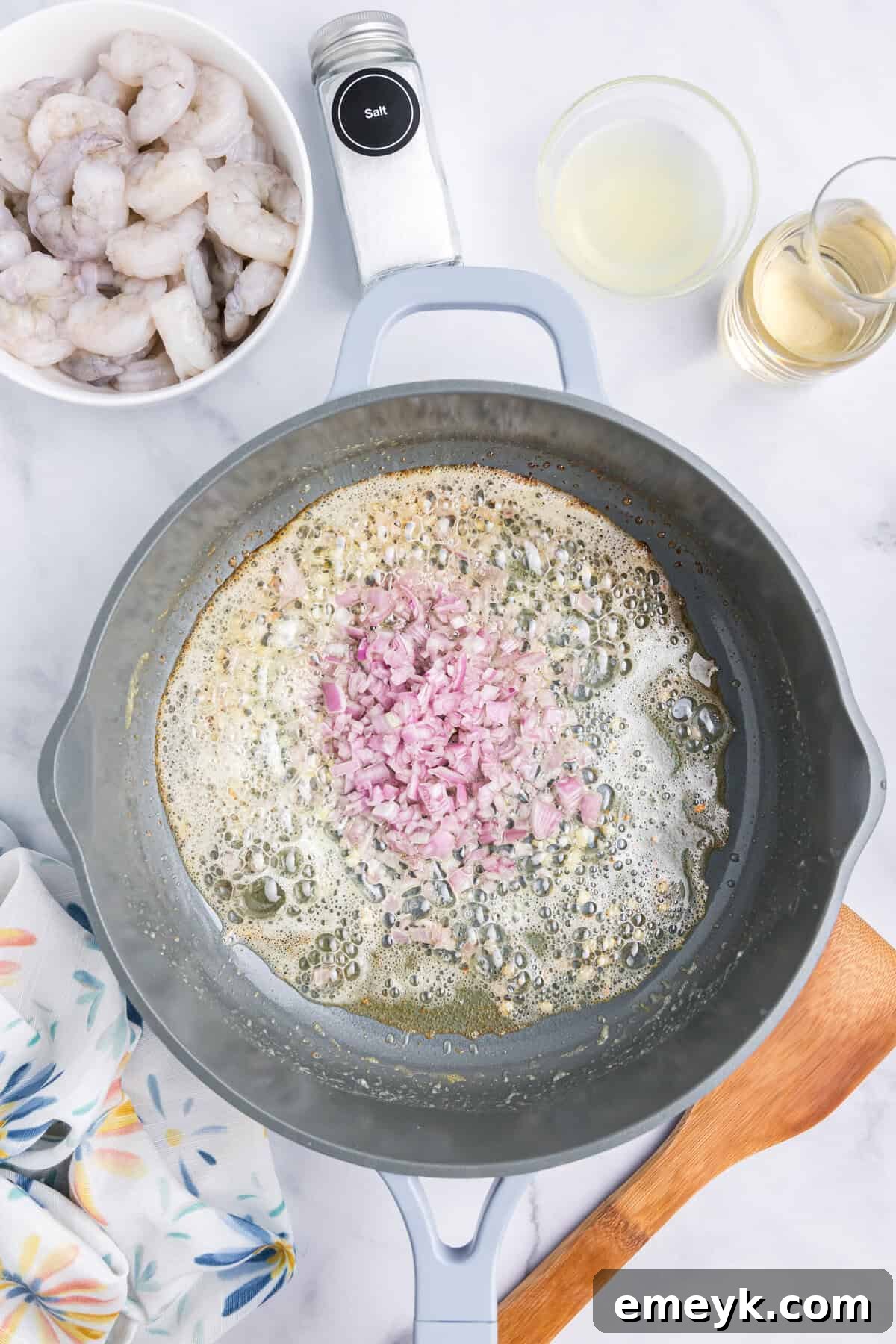 Bright Lemon Shrimp Orzo 8 Lemon Shrimp and Orzo shallots in a pan