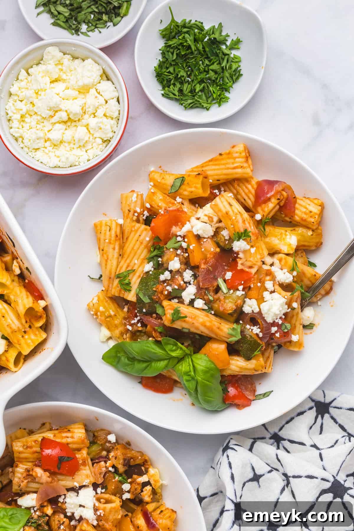 Mediterranean Harvest Roasted Pasta Bake 9 A bowl filled with Mediterranean Roasted Vegetable Pasta Bake, ready to be enjoyed