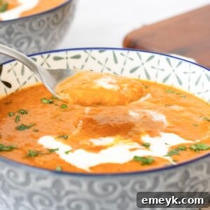 Hearty Tomato Lentil Soup 12 Lentil Tomato Soup with spoon in a bowl