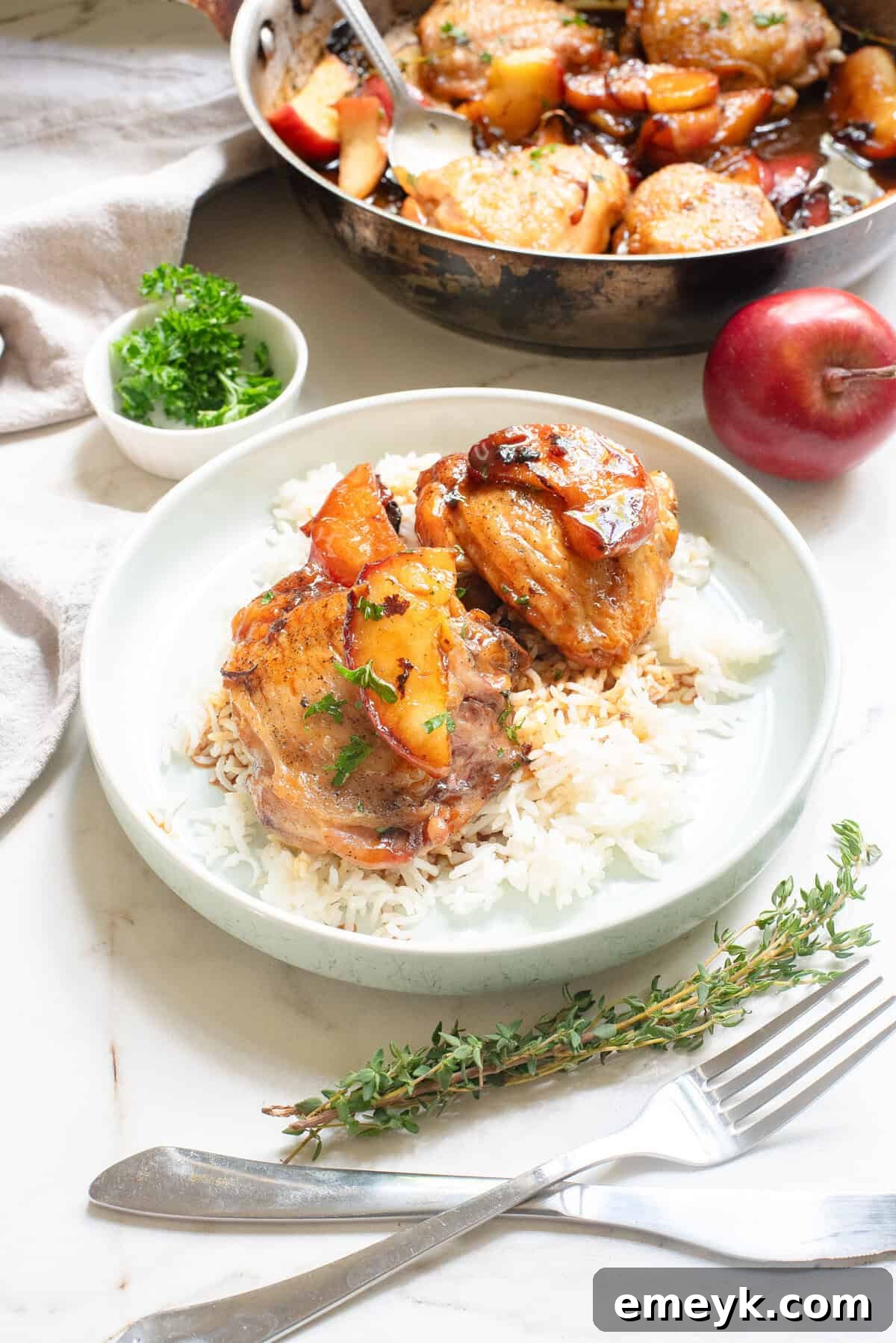 Skillet Apple Cider Chicken plated on a white dish, ready for dining.
