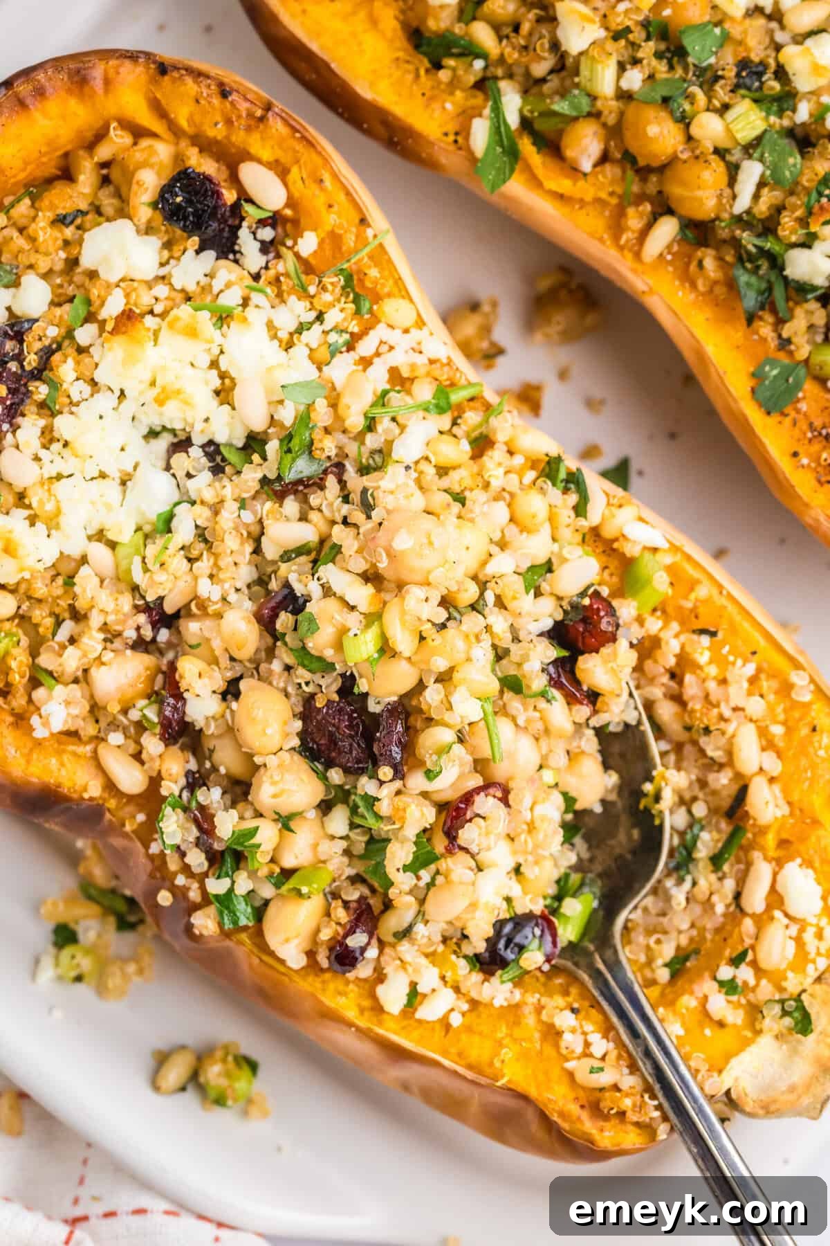 Sun-Kissed Mediterranean Stuffed Butternut 2 Mediterranean Stuffed Butternut Squash with a spoon