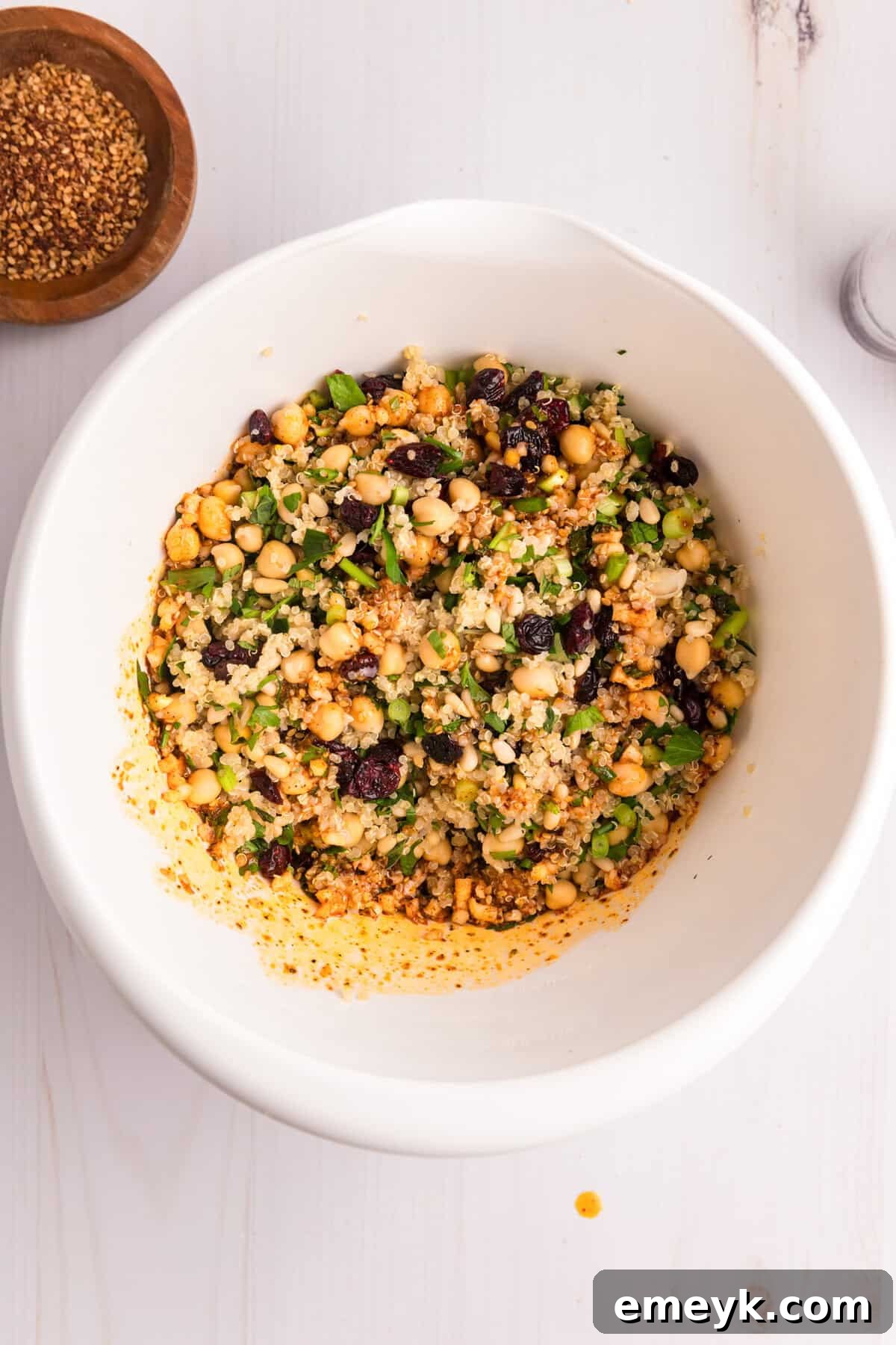 Sun-Kissed Mediterranean Stuffed Butternut 9 Mediterranean Stuffed Butternut Squash quinoa mixture in a bowl