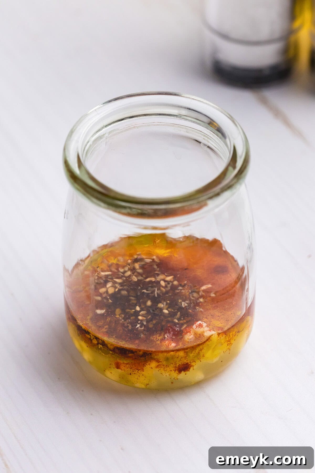 Sun-Kissed Mediterranean Stuffed Butternut 10 Mediterranean Stuffed Butternut Squash dressing in a jar