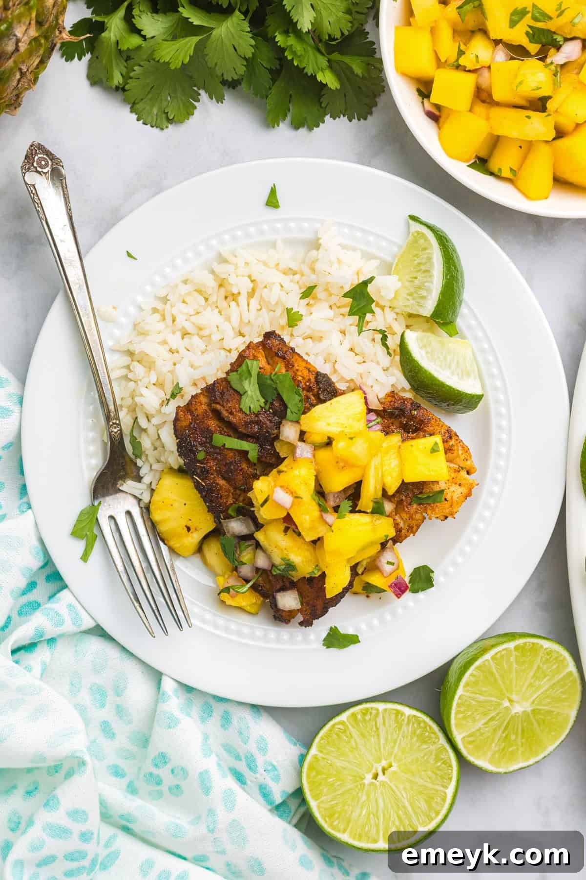 Effortless Blackened Cod 13 Easy Blackened Cod recipe on a white plate with lemon wedge
