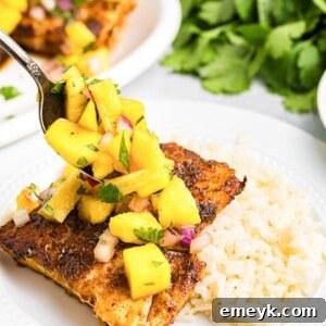 Easy Blackened Cod served with rice and pineapple salsa