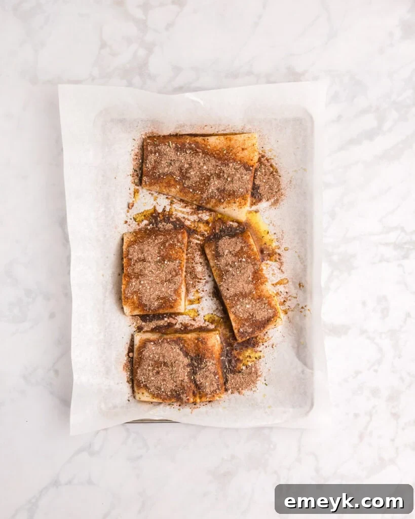 Effortless Blackened Cod 10 Easy Blackened Cod cod with spices on a plate, ready to be cooked